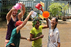 Playing with water during the Lao New Year. Photo by Son Paphayson.