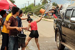 Water play between a pickup and a roadside team.