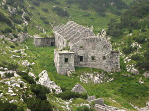 Ruins of a stone building between the Krn lake and the Bogatinsko saddle, Triglav national park.