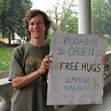 Me with a free hugs sign in Ljubljana, Slovenia.