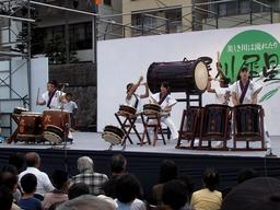 Girl band playing Japanese drums